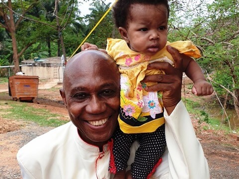 Picture with an orphaned baby from our GAMB Orphanage